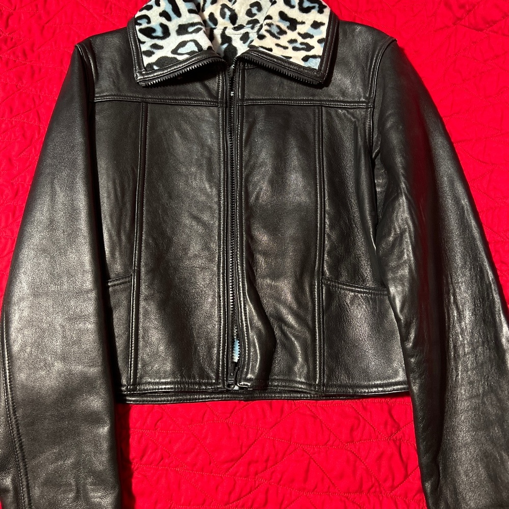 Reversible leather jacket with blue/black suede cheetah interior